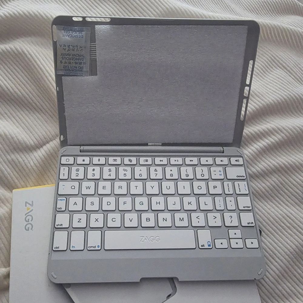 ZAGG Folio hinged keyboard folio for ipad mini. New In Box